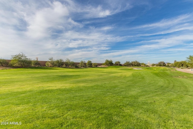 view of home's community featuring a lawn