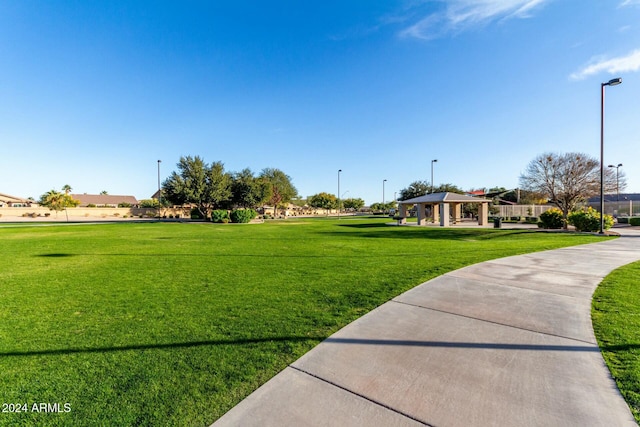 view of home's community with a gazebo and a lawn