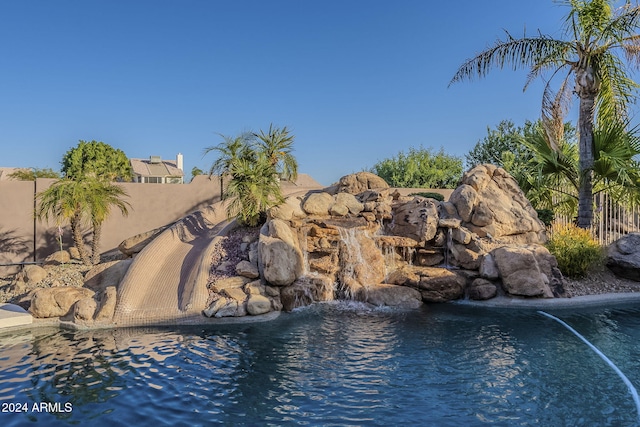 24005 N 45th Dr, Glendale, AZ 85310 - view of swimming pool featuring a small pond
