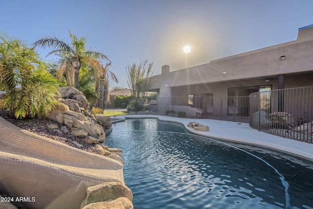 view of swimming pool featuring a patio area