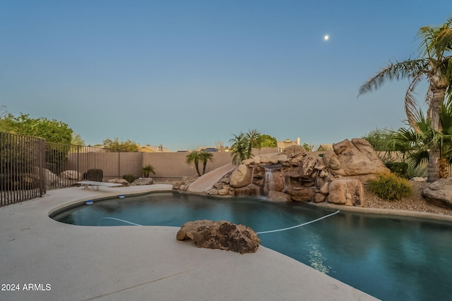 view of pool featuring a water slide