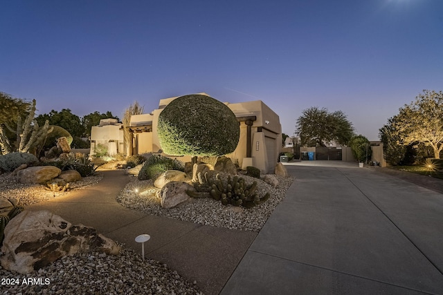 24005 N 45th Dr, Glendale, AZ 85310 - view of front of house featuring stucco siding and driveway