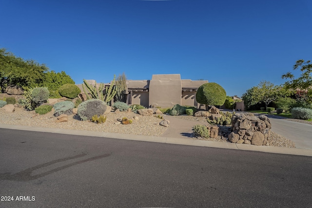 24005 N 45th Dr, Glendale, AZ 85310 - pueblo revival-style home featuring driveway and stucco siding
