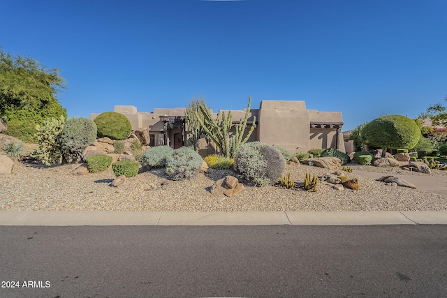 view of adobe home