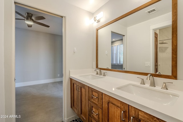 bathroom featuring vanity and ceiling fan