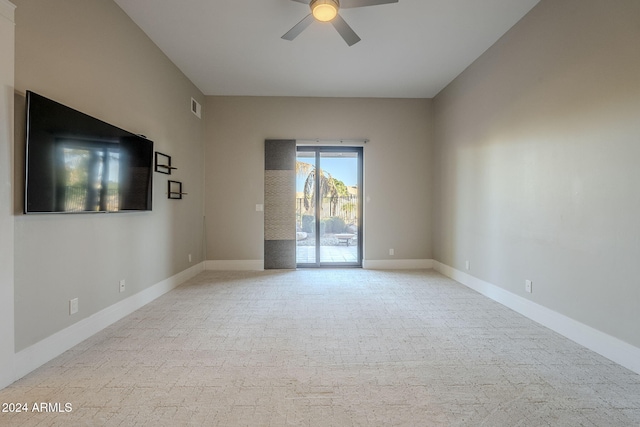 carpeted empty room with ceiling fan