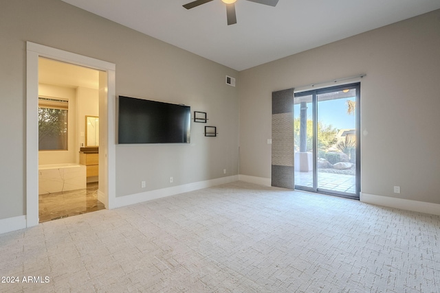 interior space featuring ceiling fan