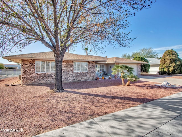 single story home featuring a garage