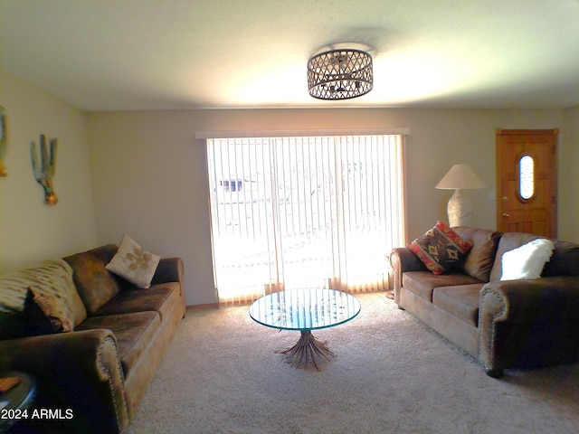 living room featuring light carpet