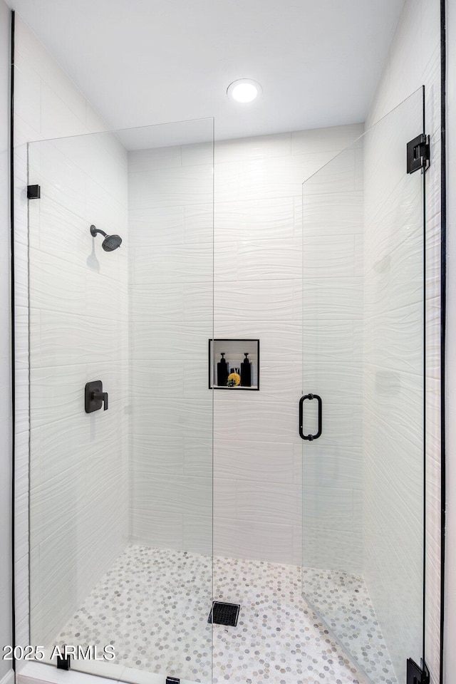 bathroom featuring walk in shower