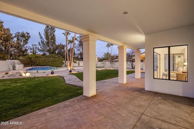 view of patio / terrace with a fenced in pool