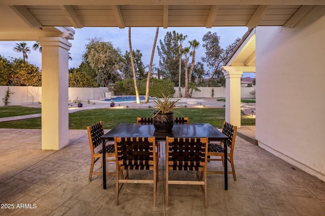 view of patio / terrace with a fenced in pool