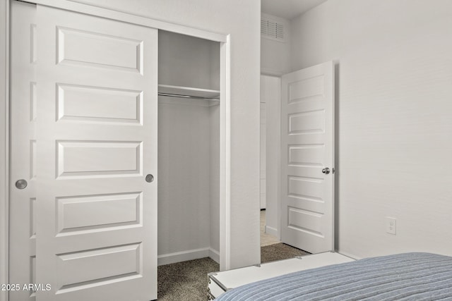 1342 W Hess Ave, Coolidge, AZ 85128 - carpeted bedroom with a closet and baseboards