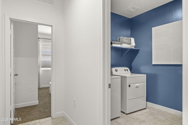 1342 W Hess Ave, Coolidge, AZ 85128 - washroom with baseboards, separate washer and dryer, and light tile patterned floors