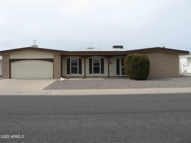 ranch-style home with a garage