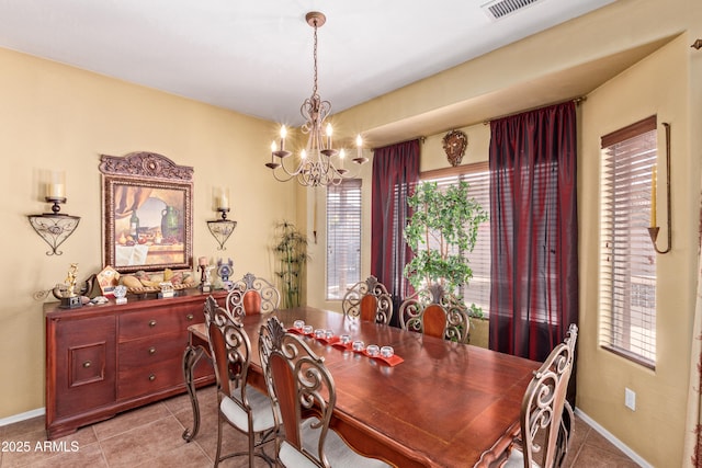 5314 W Bowker St, Laveen, AZ 85339 - dining area with a chandelier, light tile patterned flooring, and healthy amount of natural light