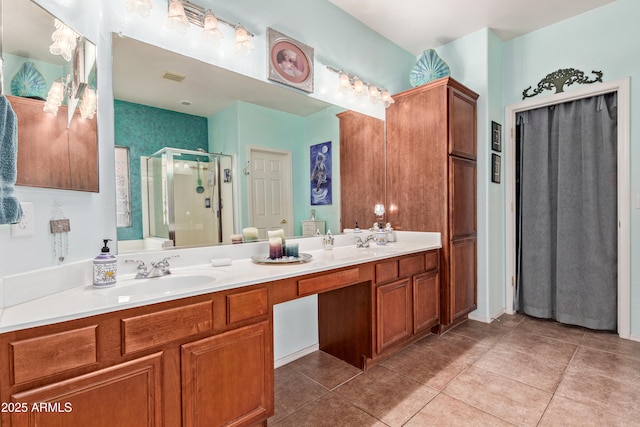5314 W Bowker St, Laveen, AZ 85339 - bathroom with a stall shower, double vanity, and tile patterned floors
