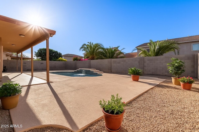 5314 W Bowker St, Laveen, AZ 85339 - fenced backyard with a patio area and a jacuzzi