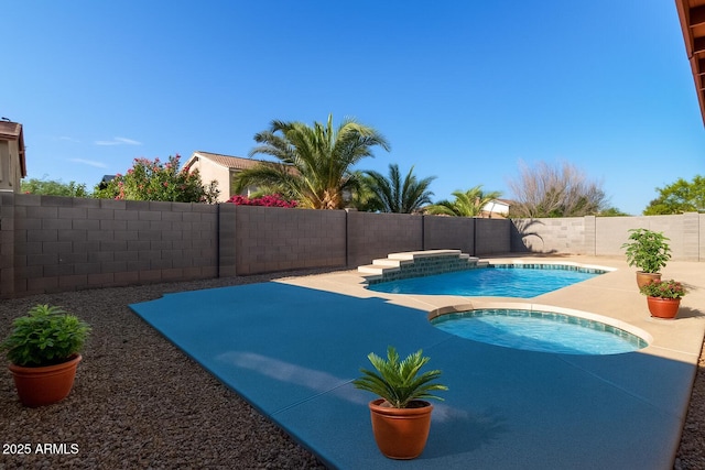 5314 W Bowker St, Laveen, AZ 85339 - view of swimming pool featuring an in-ground hot tub and a fenced backyard