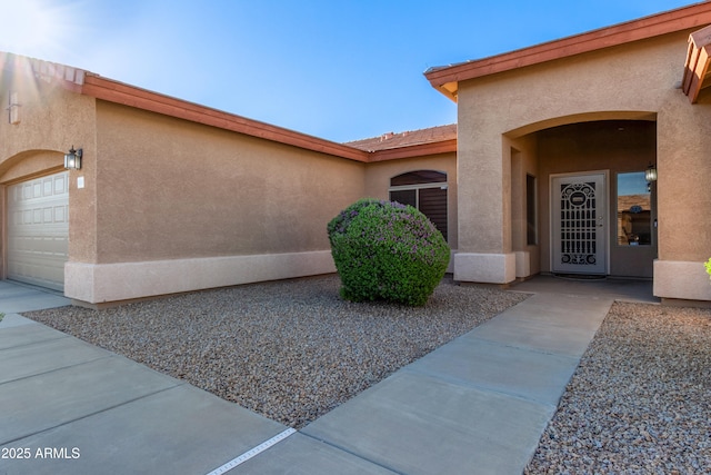 5314 W Bowker St, Laveen, AZ 85339 - property entrance featuring stucco siding and a garage