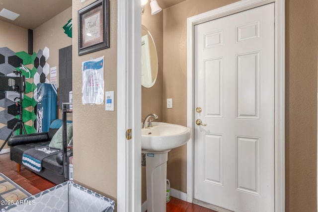 bathroom featuring wood finished floors