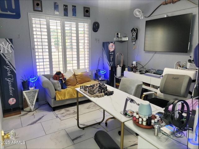 office featuring marble finish floor