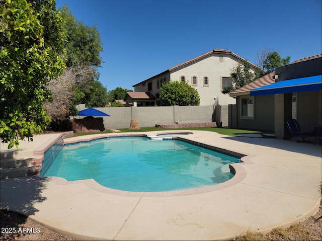 view of swimming pool featuring a patio, a fenced backyard, an in ground hot tub, and a fenced in pool