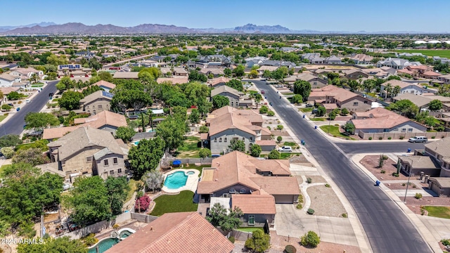 bird's eye view featuring a mountain view and a residential view