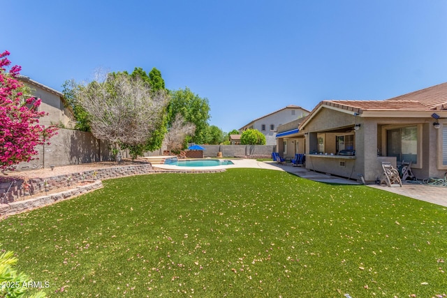 view of yard featuring a fenced in pool, a fenced backyard, and a patio area
