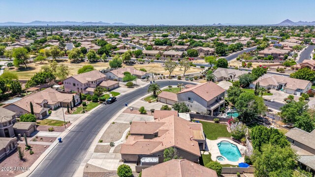 bird's eye view featuring a residential view and a mountain view