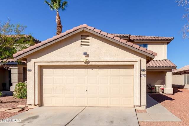 view of front of property with a garage