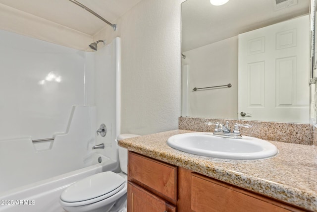 full bath with a textured wall, vanity, toilet, tub / shower combination, and visible vents