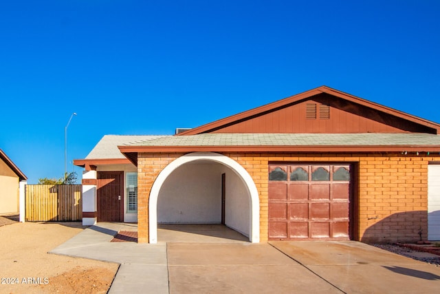 view of front of property featuring a garage