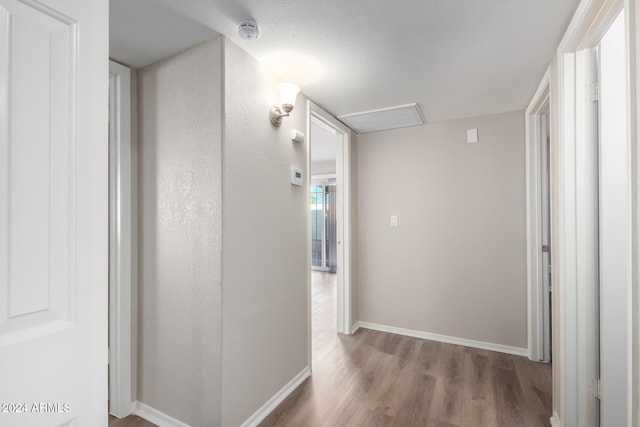 hallway featuring light hardwood / wood-style floors