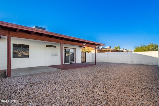 back of property featuring a patio area