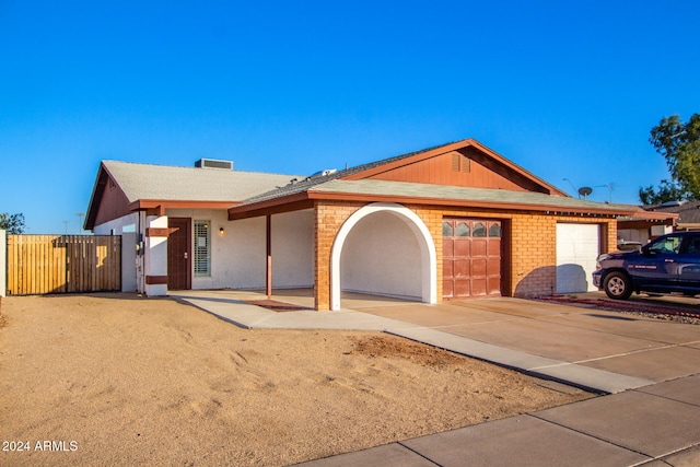 ranch-style home with a garage