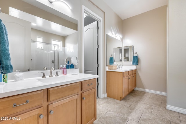 4630 E Navigator Ln, Phoenix, AZ 85050 - full bathroom with vanity, a stall shower, and baseboards