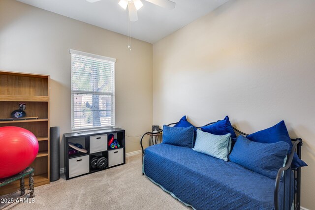 4630 E Navigator Ln, Phoenix, AZ 85050 - living area with carpet, a ceiling fan, and baseboards