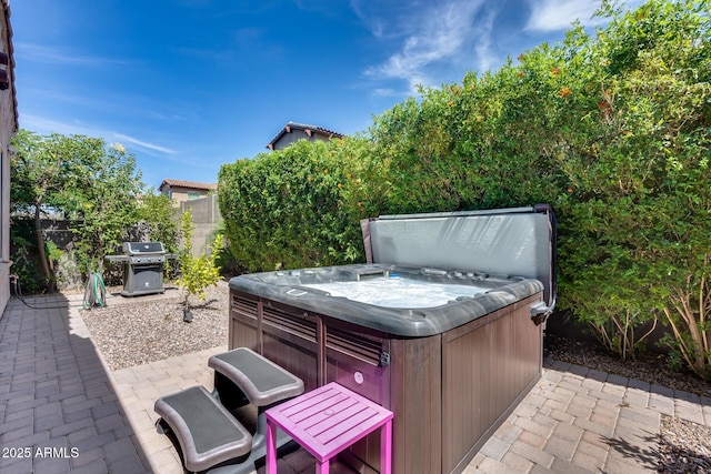 4630 E Navigator Ln, Phoenix, AZ 85050 - view of patio featuring a hot tub and a grill