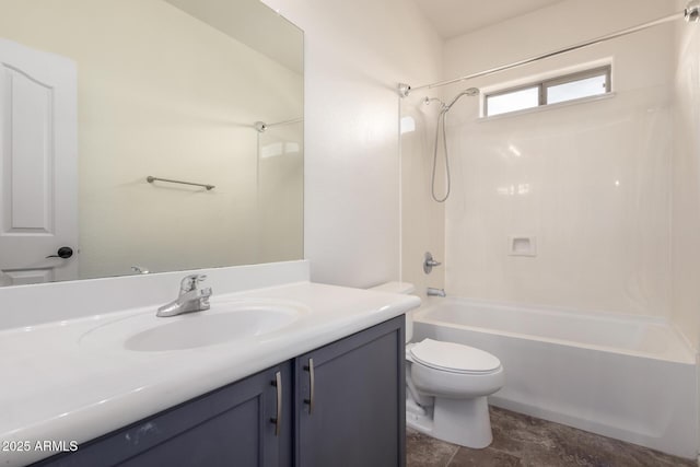 full bathroom featuring tub / shower combination, vanity, and toilet