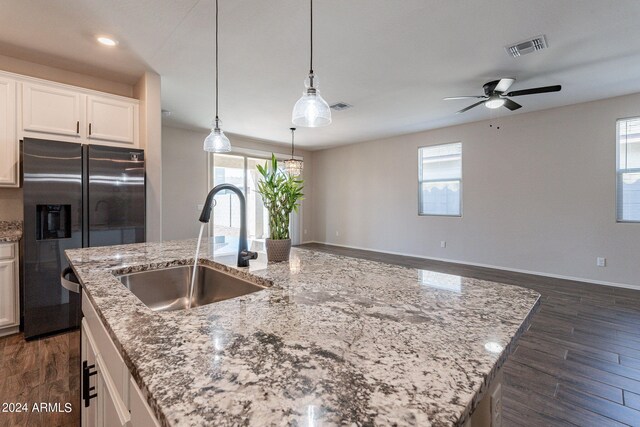 kitchen with a wealth of natural light and white cabinets