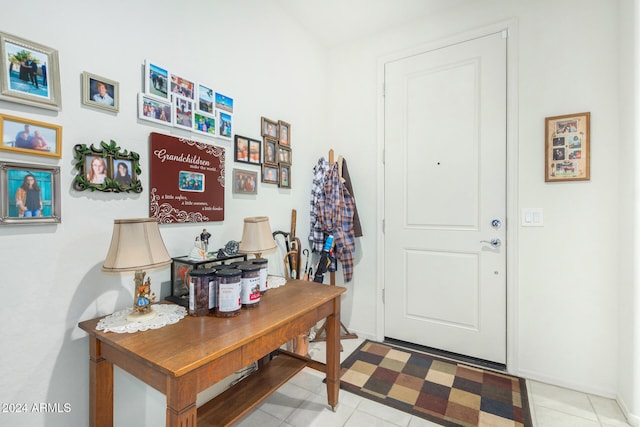 entrance foyer featuring light tile patterned floors