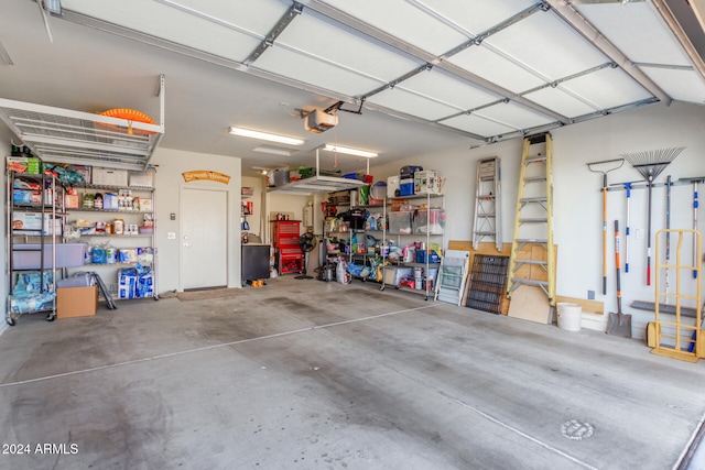 garage featuring a garage door opener