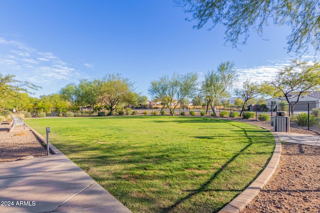 view of home's community featuring a yard