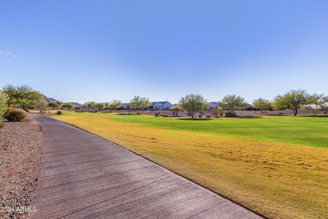 surrounding community featuring a lawn