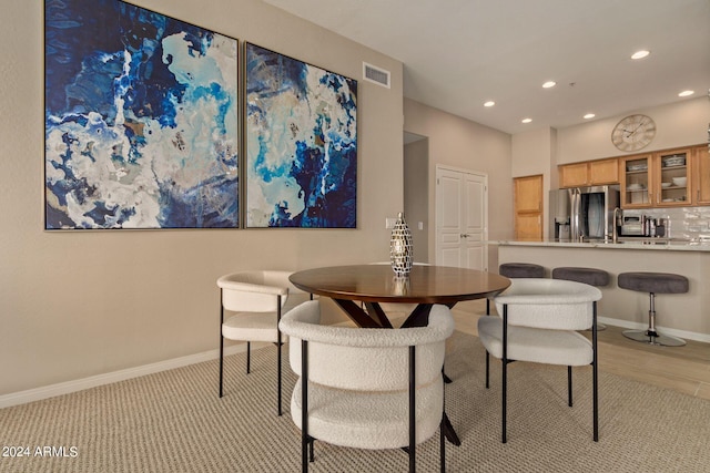 dining room featuring recessed lighting, visible vents, and baseboards