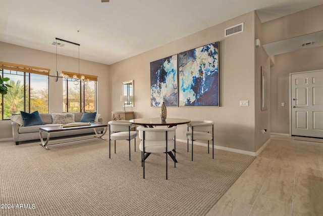 dining area with a notable chandelier