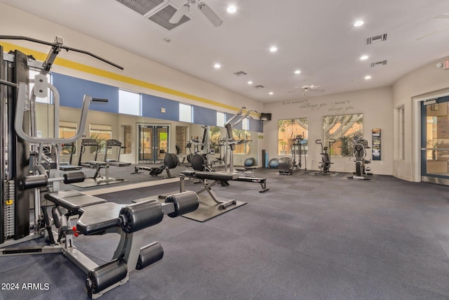 exercise room with recessed lighting, visible vents, a ceiling fan, and french doors