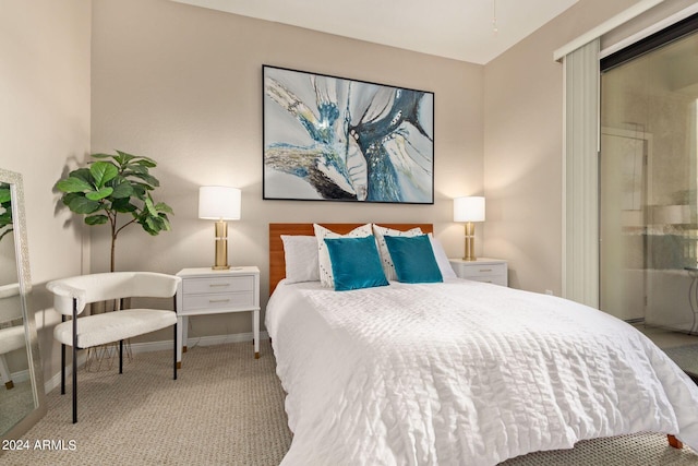 bedroom featuring baseboards and light colored carpet