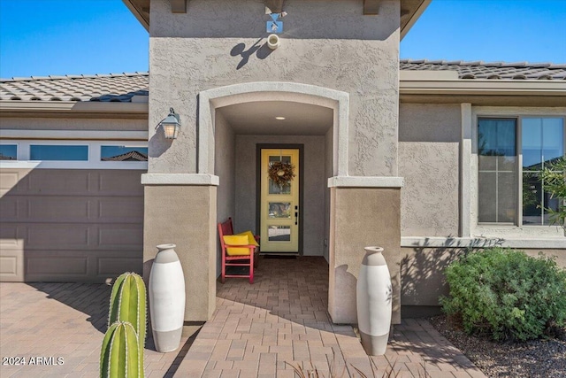 property entrance featuring a garage